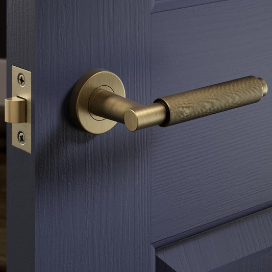Howdens Fuller and Forge Iseo Antique Brass Knurled Lever on Rose Door Handle Pair Howdens