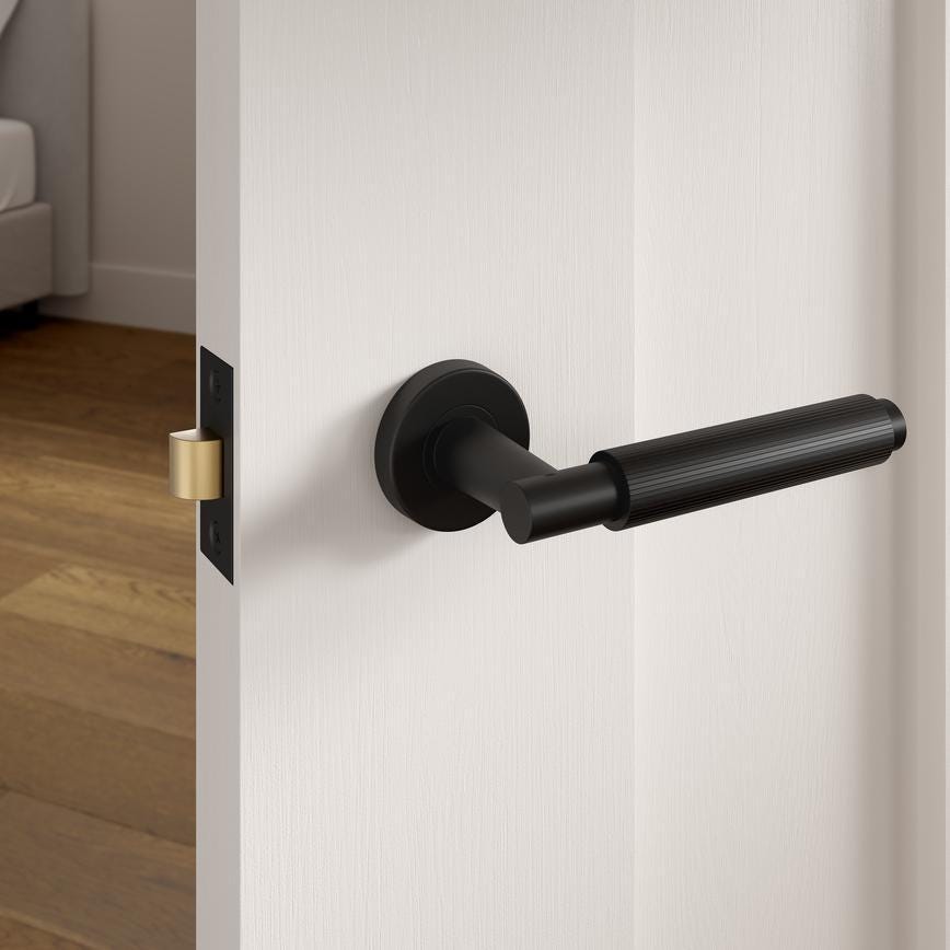 Howdens Alento Dual-Tone Chrome Lever on Rose Door Handle Pair