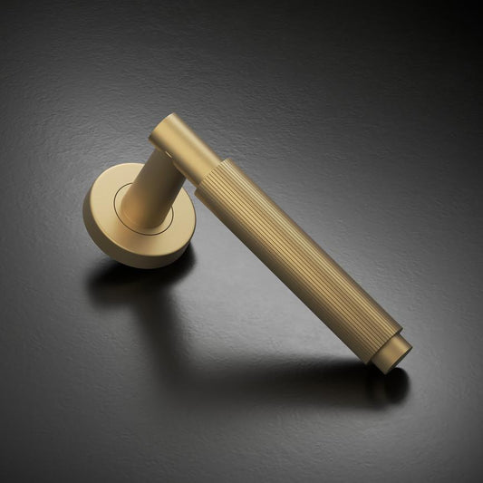 Howdens Fuller and Forge Orta Satin Brass Fluted Lever on Rose Door Handle Pair Howdens