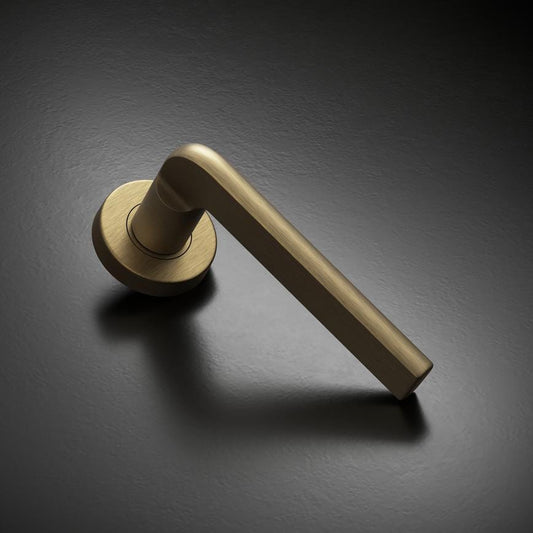 Fuller and Forge Munch Antique Brass Lever on Rose Door Handle Pair Howdens