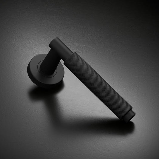 Fuller and Forge Iseo Matt Black Knurled Lever on Rose Door Handle Pair Howdens