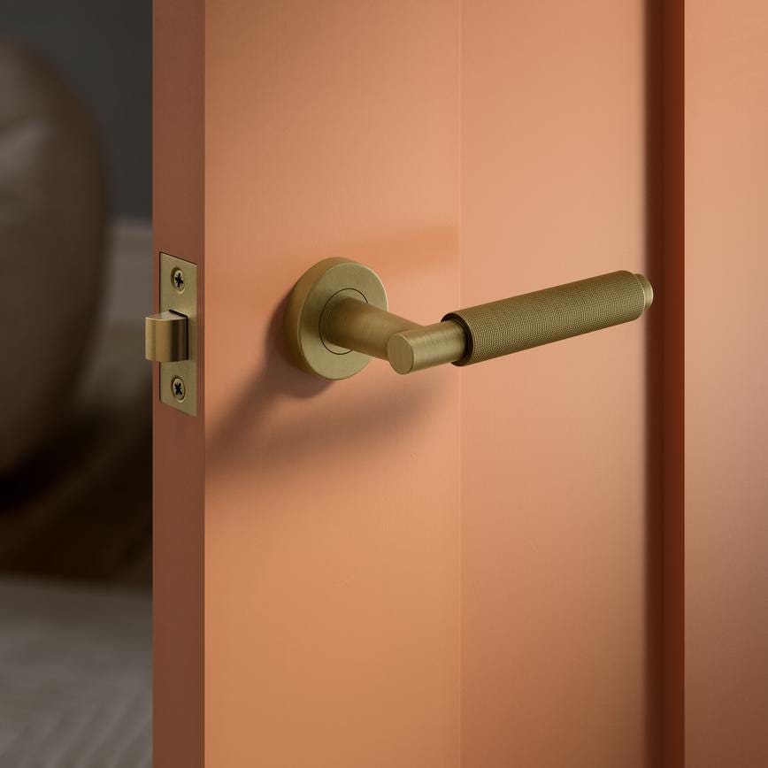Howdens Fuller and Forge Iseo Antique Brass Knurled Lever on Rose Door Handle Pair Howdens
