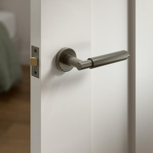 Fuller and Forge Orta Satin Bronze Fluted Lever on Rose Door Handle Pair Howdens
