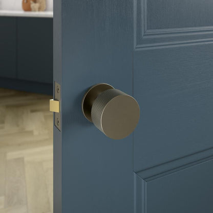 Howdens Fuller and Forge Orta Satin Bronze 50mm Fluted Round Mortice Knob on Slim Rose Pair Howdens