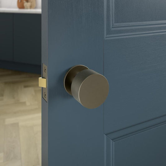 Howdens Fuller and Forge Orta Satin Bronze 50mm Fluted Round Mortice Knob on Slim Rose Pair Howdens