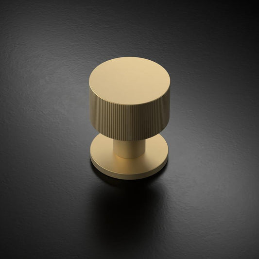 Fuller and Forge Orta Satin Brass 50mm Fluted Round Mortice Knob on Slim Rose Pair Howdens