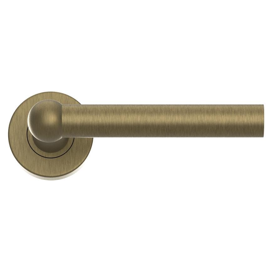 Fuller and Forge Como Antique Brass Lever on Rose Door Handle Pair Howdens