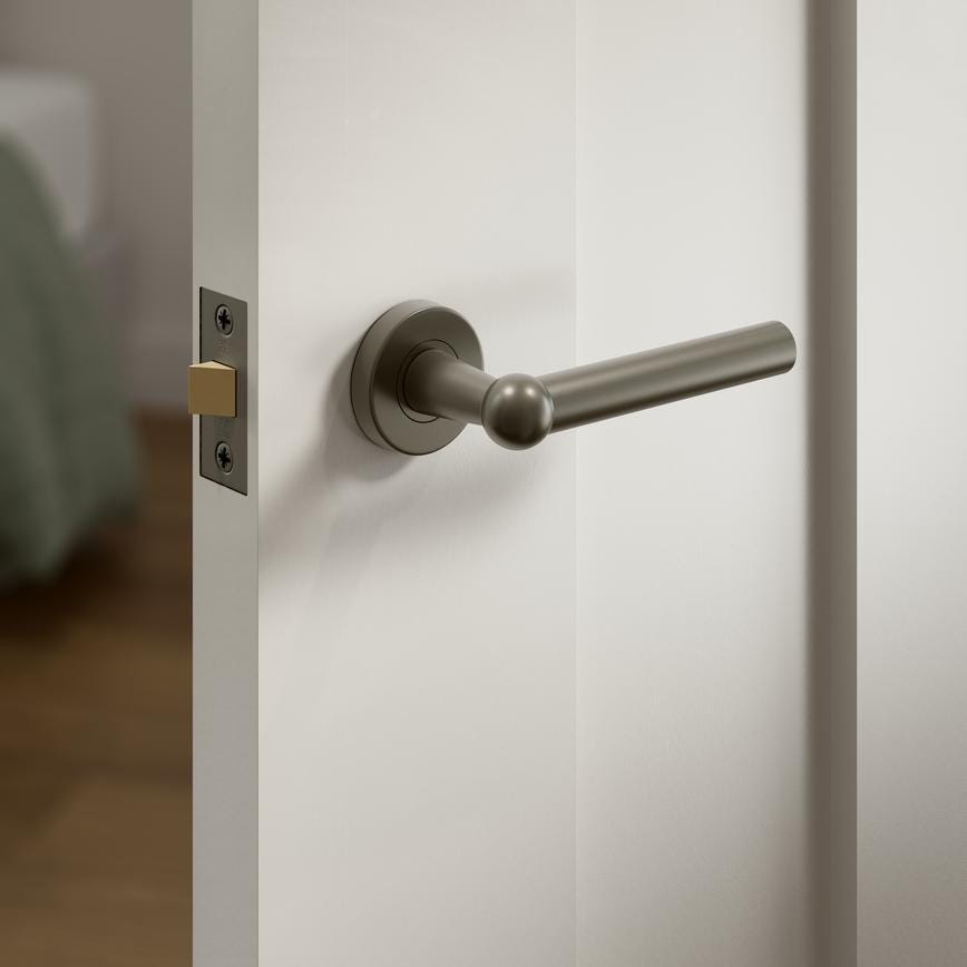 Fuller and Forge Como Satin Bronze Lever on Rose Door Handle Pair Howdens