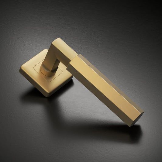 Fuller and Forge Tanaro Satin Brass Hexagonal Lever on Rose Door Handle Pair Howdens