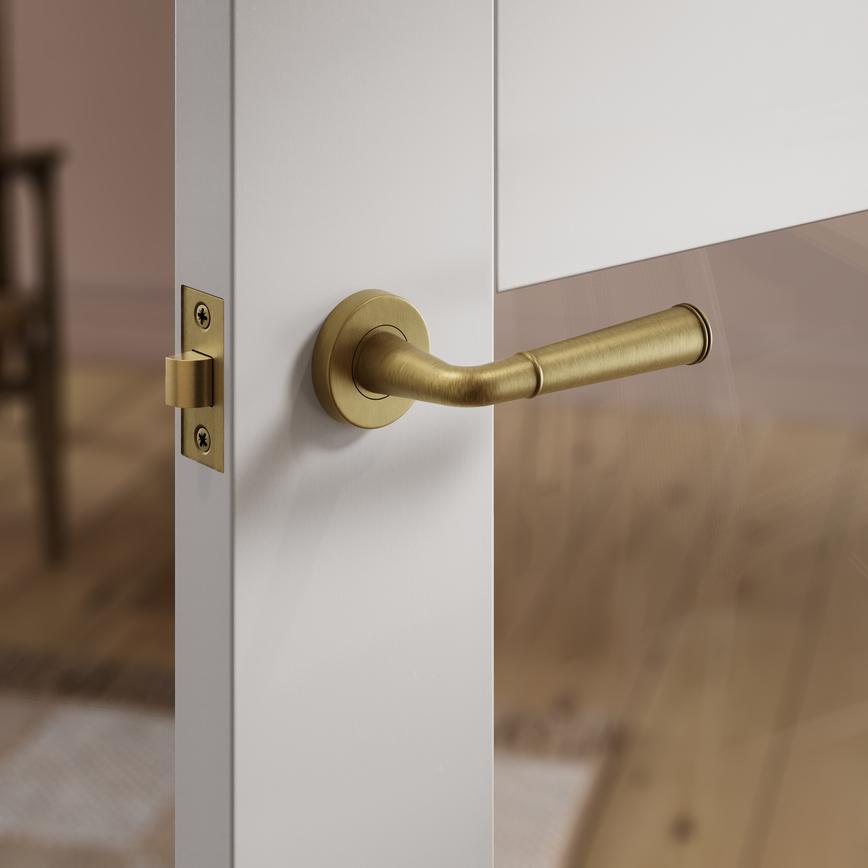 Fuller and Forge Arno Antique Brass Lever on Rose Door Handle Pair Howdens