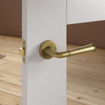 Fuller and Forge Arno Antique Brass Lever on Rose Door Handle Pair Howdens