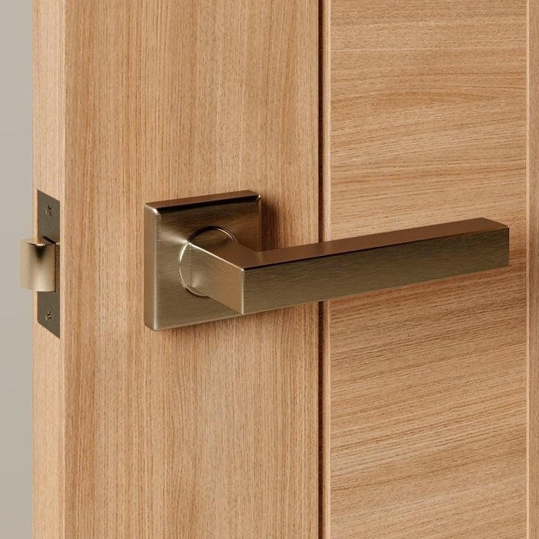 Howdens Burford Antique Brass Lever on Rose Door Handle Pair