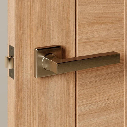 Howdens Burford Antique Brass Lever on Rose Door Handle Pair
