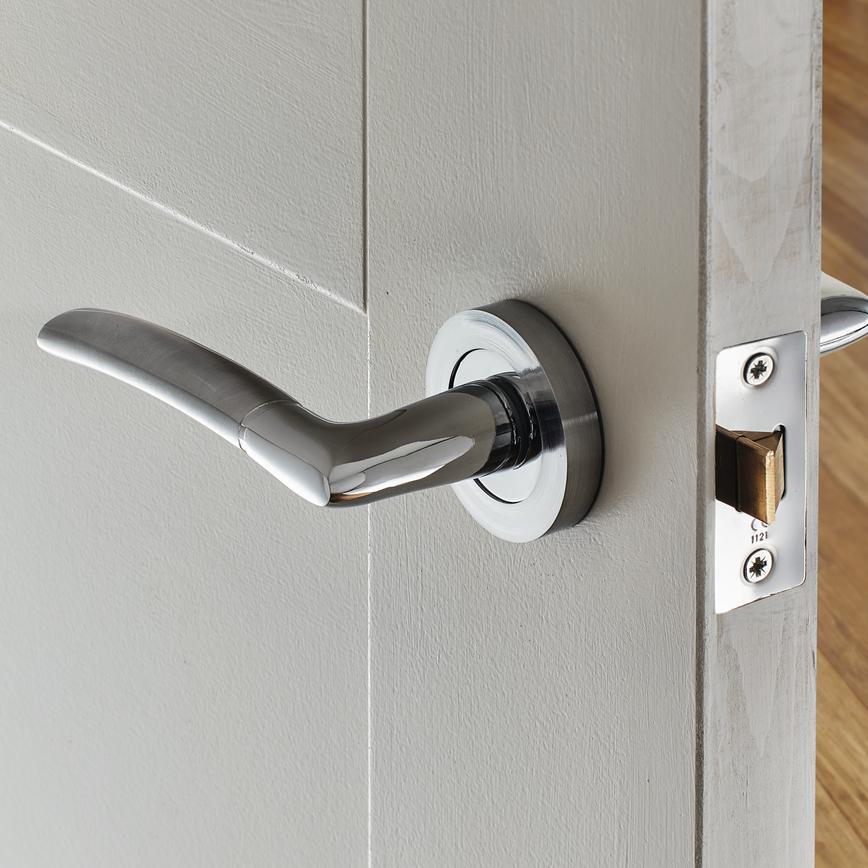 Howdens Newington Dual Tone Chrome Lever on Rose Door Handle Pair