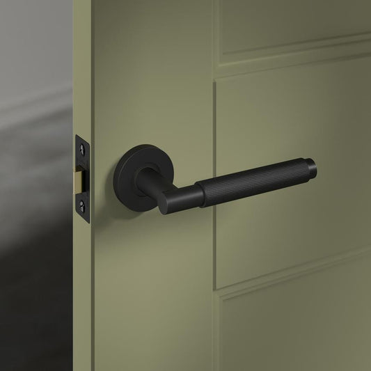 Fuller and Forge Iseo Matt Black Knurled Lever on Rose Door Handle Pair Howdens