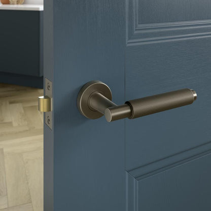 Howdens Fuller and Forge Iseo Satin Bronze Knurled Lever on Rose Door Handle Pair Howdens