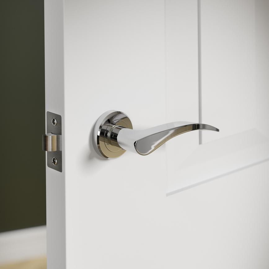 Howdens Carlisle Brass Serozzetta Olivier Polished Chrome Fire Rated Lever on Rose Door Handle Pair
