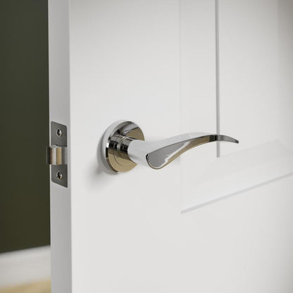 Howdens Carlisle Brass Serozzetta Olivier Polished Chrome Fire Rated Lever on Rose Door Handle Pair