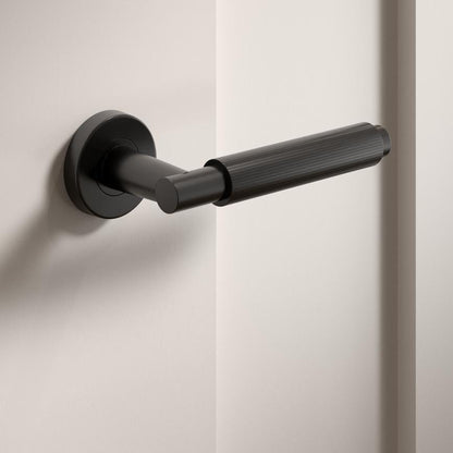 Howdens Alento Dual-Tone Chrome Lever on Rose Door Handle Pair