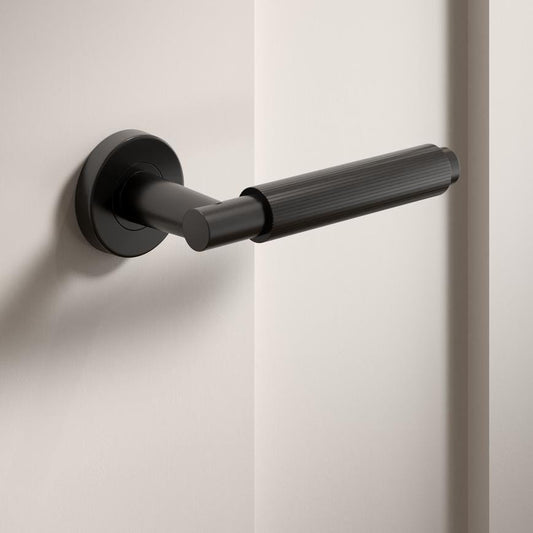 Howdens Fuller and Forge Orta Matt Black Fluted Lever on Rose Door Handle Pair Howdens