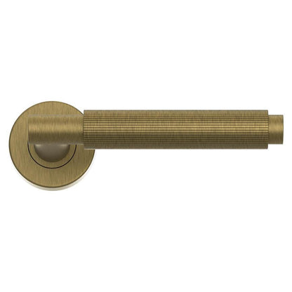 Howdens Fuller and Forge Orta Antique Brass Fluted Lever on Rose Door Handle Pair Howdens