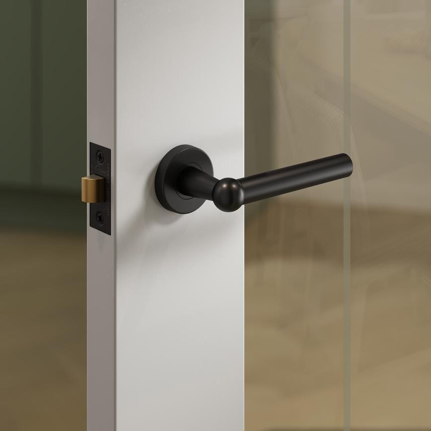 Fuller and Forge Como Matt Black Lever on Rose Door Handle Pair Howdens