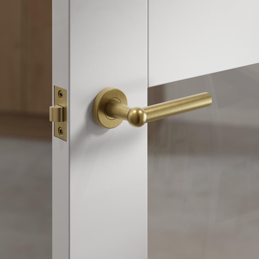 Fuller and Forge Como Antique Brass Lever on Rose Door Handle Pair Howdens