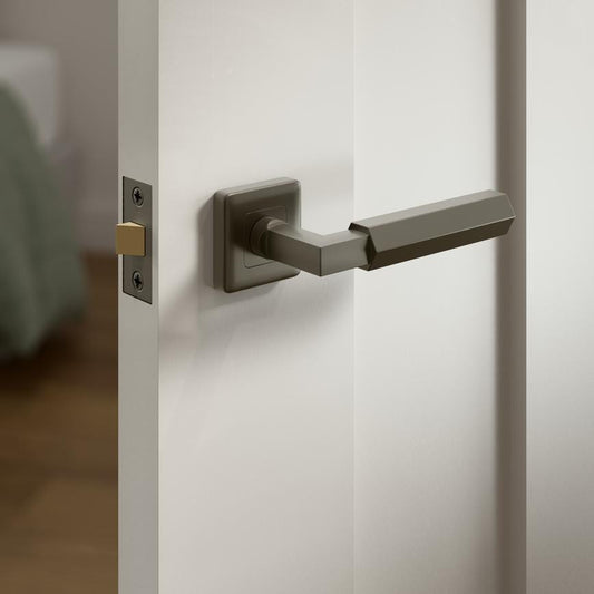 Fuller and Forge Tanaro Satin Bronze Hexagonal Lever on Rose Door Handle Pair Howdens