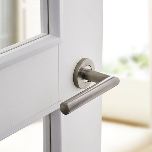 Howdens Lecco Satin Stainless Steel Fire Rated Mitred Lever on Rose Door Handle Pair