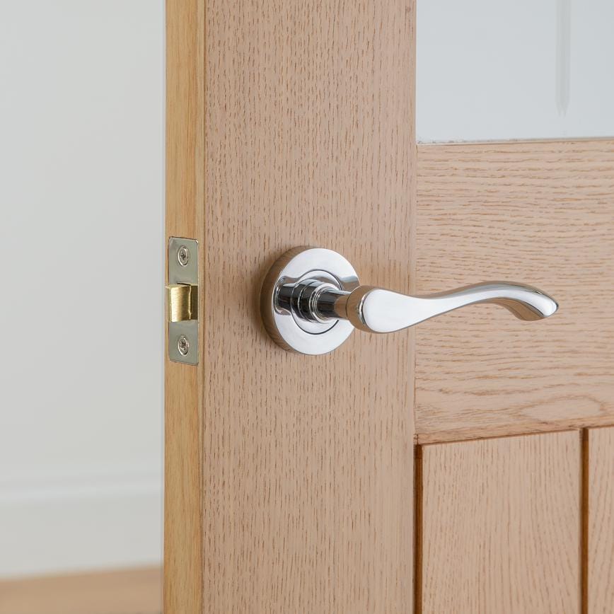 Howdens Fino Polished Chrome Lever on Rose Door Handle Pair