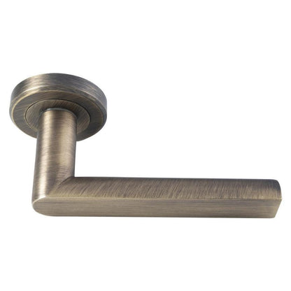 Howdens Carlisle Brass Serozzetta Edge Antique Brass Fire Rated Lever on Rose Door Handle Pair
