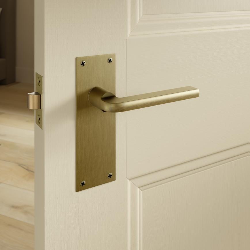 Fuller and Forge Munch Antique Brass Lever on Slim Backplate Latch Door Handle Pair Howdens